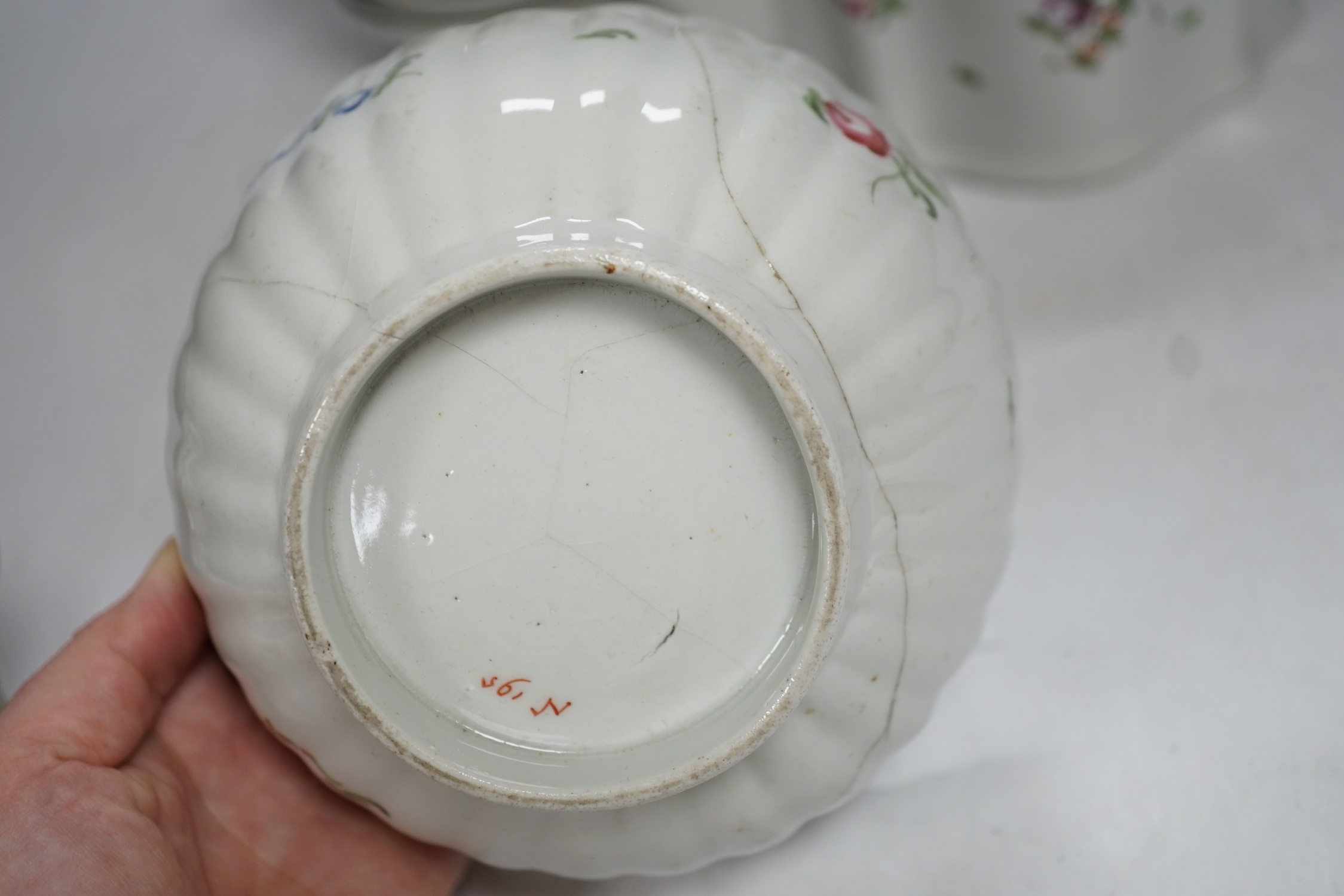 A thirteen piece New Hall porcelain part tea set, ‘knitting wool’ pattern number 195